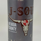 Close-up of a clear sticker on a gray water bottle, featuring a custom longhorn skull design with red and brown artwork and a transparent background.