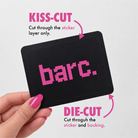 Example graphic explaining kiss-cut vs die-cut stickers, showing a black sticker with pink artwork and arrows pointing to the kiss-cut line through the sticker layer and the die-cut edge through the sticker and backing.
