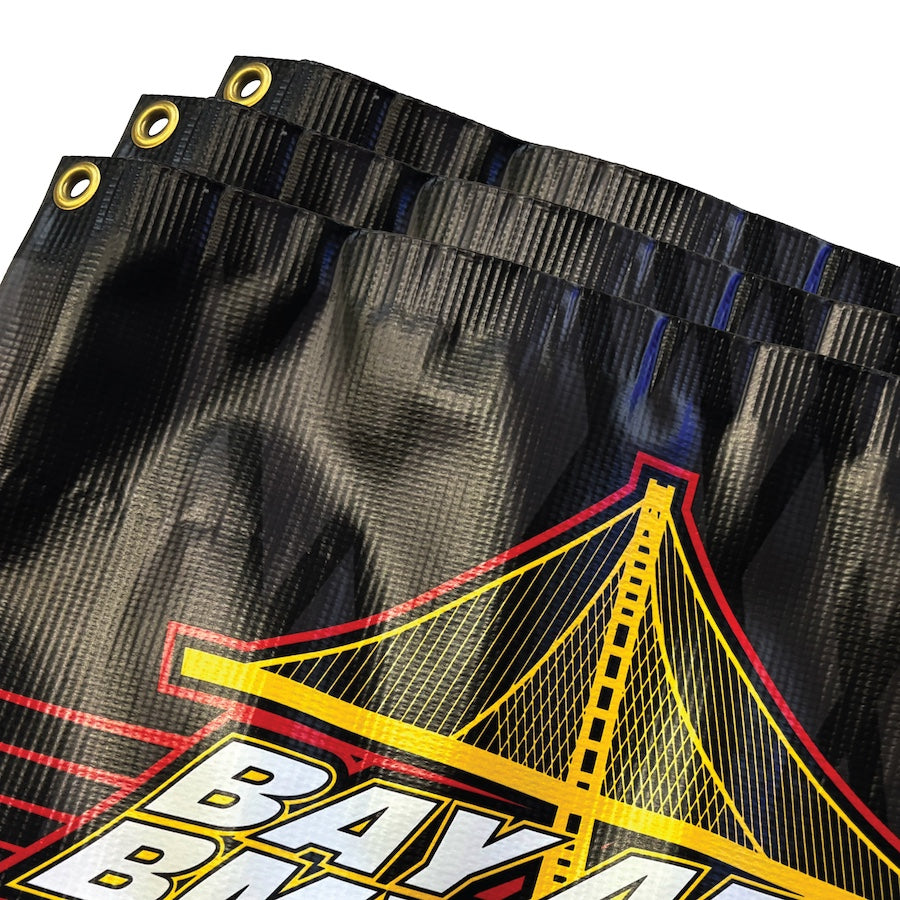 A close-up of a banner featuring a graphic design with a bridge