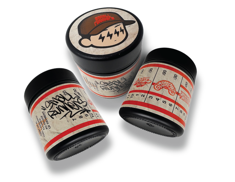 Custom printed jar labels on 3oz matte black jars for cannabis packaging